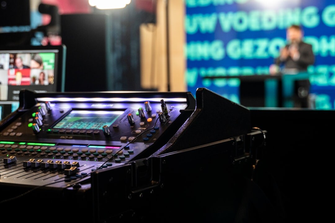 News presenter reading from teleprompter in a television studio