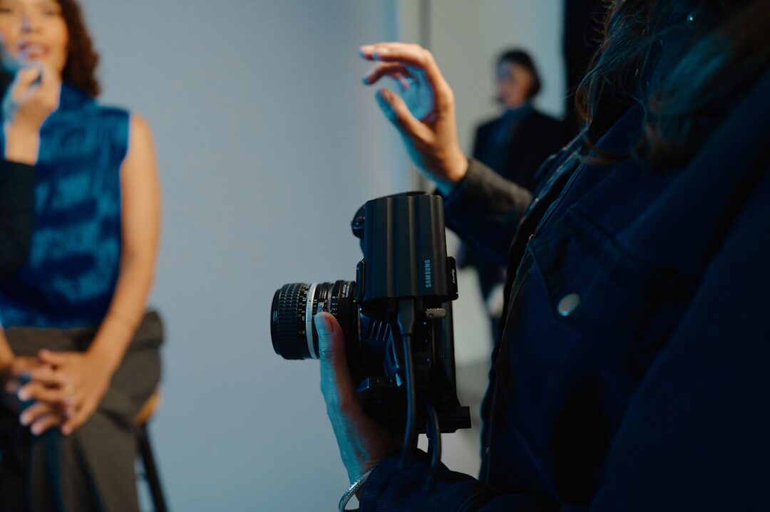 Professional speaker presenting confidently in front of a camera