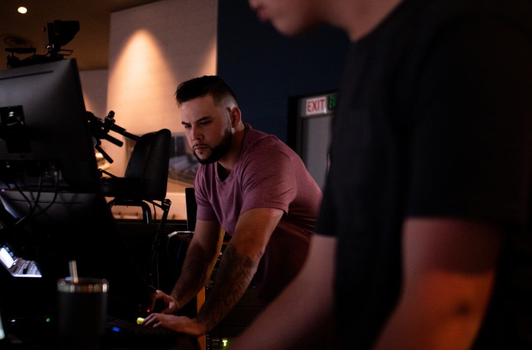 Broadcast journalism students in a professional studio training session